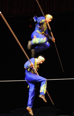 Acrobats with Uzbekistan's National Circus perform at the 12th China Wuqiao International Circus Festival in Shijiazhuang, capital of north China's Hebei Province, Nov. 2, 2009.(Xinhua/Gong Zhihong)