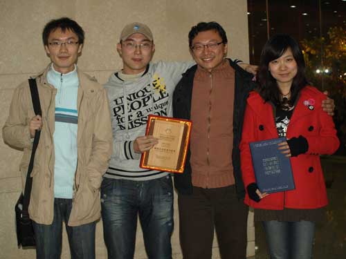 Winner of the the Best Interactive Installation award (from left to right): Zhu Qiming, Lu Yungen, Wang Jun and Lai Weidan. They won the prize for a joint-work &apos;The Door.&apos; 