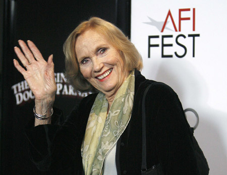 Cast member Eva Marie Saint waves at a screening for the 50th anniversary of Alfred Hitchcock