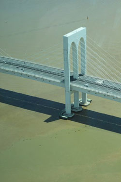 Bridge, Macau. One of the many bridges in Macau that connects the Macau Paninsula with Coloane and Taipa villages. View from Macau Tower.