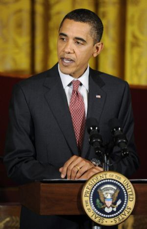 U.S. President Barack Obama welcomes guests to an evening of classical music in the East Room of the White House in Washington November 4, 2009.