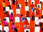 Designing new clothes for children of Wenchuan