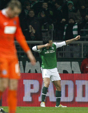 Werder Bremen's Hugo Almeida celebrates after scoring against Austria Vienna during their Europa League soccer match in Bremen November 5, 2009.