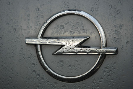 The logo of Opel is seen at a car at the Opel plant in Bochum November 4, 2009. The board of General Motors has decided not to sell its Opel unit to Canadian auto parts maker Magna, GM confirmed the decision made by its 13-member board after a meeting of directors on Tuesday in Detroit.(Xinhua/Reuters Photo)