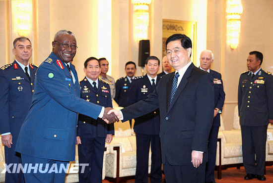Hu Jintao, Chairman of the Central Military Commission meets the heads of foreign air force delegations, who were in Beijing for an international military forum on peace and development to mark the 60th founding anniversary of the People's Liberation Army (PLA) air force.