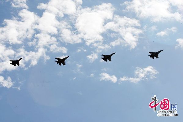 Jet fighters fly over the Tian'anmen Square in the celebrations for the 60th anniversary of the founding of the People's Republic of China, in Beijing, capital of China, Oct. 1, 2009. [Xinhua] 
