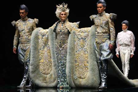 Model present creations at the 'Rosestudio' GUO Pei High Class Fashion Show 2010 during the China Fashion Week in Beijing, capital of China, Nov. 6, 2009. 