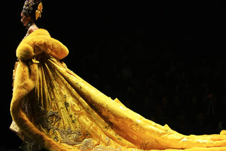 A model presents a creation at the 'Rosestudio' GUO Pei High Class Fashion Show 2010 during the China Fashion Week in Beijing, capital of China, Nov. 6, 2009. 