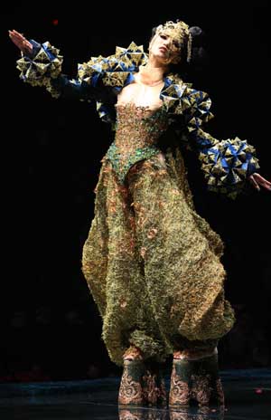 A model presents a creation at the 'Rosestudio' GUO Pei High Class Fashion Show 2010 during the China Fashion Week in Beijing, capital of China, Nov. 6, 2009. 