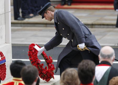 Britain's Prince William lays a wreath at the Cenotaph during the annual Remembrance Sunday ceremony in Whitehall, in central London November 8, 2009. [Xinhua/Reuters]