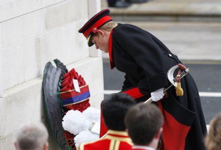 Britain's Prince Harry lays a wreath at the Cenotaph during the annual Remembrance Sunday ceremony in Whitehall, in central London November 8, 2009. [Xinhua/Reuters]