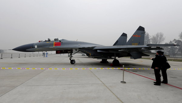 J-11 fighters. Homemade air force weapons are exhibited at the Beijing Shahe Military Airport to celebrate the 60th anniversary of the PLA air force. [CFP]