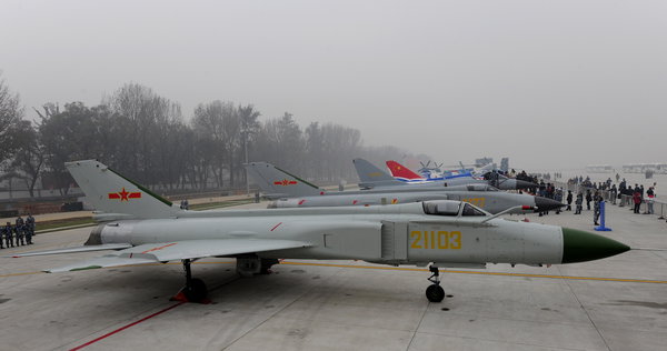 Homemade air force weapons are exhibited at the Beijing Shahe Military Airport to celebrate the 60th anniversary of the PLA air force. [CFP]