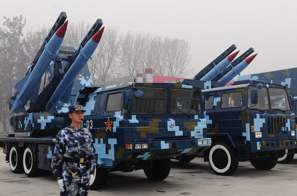 Homemade air force weapons are exhibited at the Beijing Shahe Military Airport to celebrate the 60th anniversary of the PLA air force. [CFP]