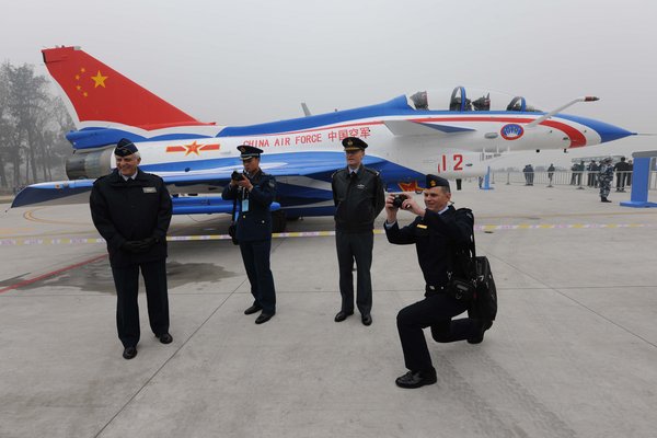 Homemade air force weapons are exhibited at the Beijing Shahe Military Airport to celebrate the 60th anniversary of the PLA air force. [CFP]