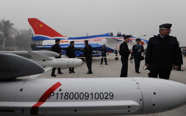 Homemade air force weapons are exhibited at the Beijing Shahe Military Airport to celebrate the 60th anniversary of the PLA air force. [CFP]