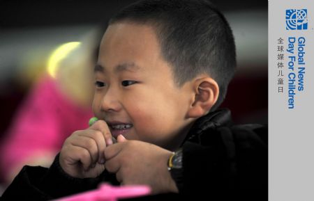 Zhu Xu attends a class in Xianfeng County of Enshi, Central China's Hubei province, October 12, 2009. [Xinhua]