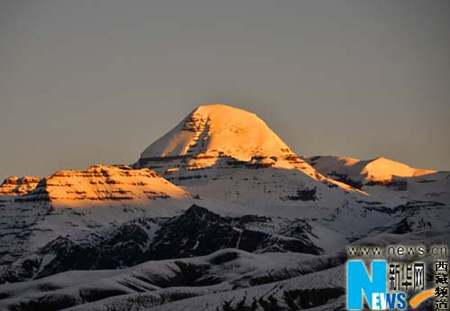 Mt. Kangrinboqe, northern Tibet, stands in the sunglow.