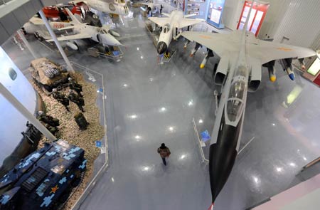 A jet fighter is displayed at China Aviation Museum in Beijing, capital of China, Nov. 9, 2009. To celebrate the 60 anniversary of the founding of the Air Force of the Chinese People's Liberation Army, an exhibition displaying the achievements of the development of the weapons and equipments of the Air Force of the Chinese People's Liberation Army will be open to the public from Nov. 15 in Beijing. 