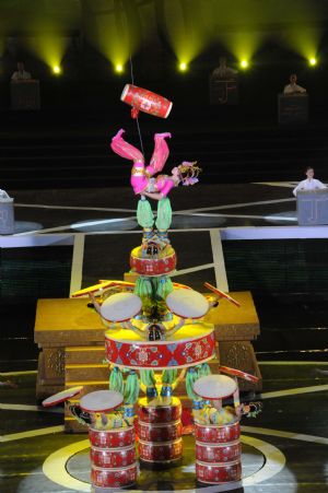 Chinese acrobats perform at the 12th China Wuqiao International Circus Festival in Cangzhou City, north China's Hebei Province, Nov. 11, 2009. Performance in Cangzhou kicked off Wednesday as the second phase of the festival. [Wang Min/Xinhua]