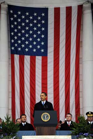 U.S. President Barack Obama speaks at a ceremony at Arlington National Cemetery in Virginia to mark Veterans Day November 11, 2009. [Xinhua/AFP]