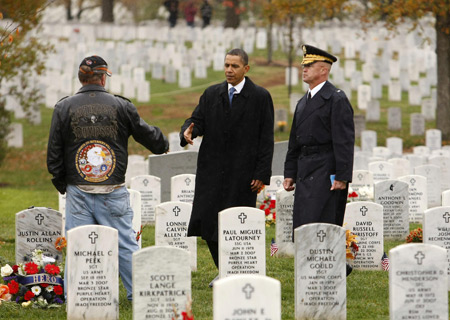 U.S. President Barack Obama speaks at a ceremony at Arlington National Cemetery in Virginia to mark Veterans Day November 11, 2009. [Xinhua/AFP]