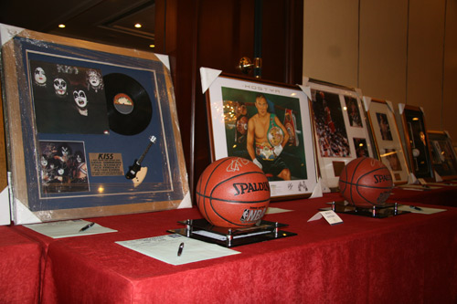 This photo taken on Wednesday, November 11, 2009 shows part of goods for silent auction during China&apos;s first professional Muay Thai event - Battlefield XI &apos;Supremacy&apos; at China World Hotel in Beijing on Wednesday evening, November 11, 2009. All the proceeds of the event will be donated to the China Children and Teenagers Foundation (CCTF) to help Chinese orphans. [CRI]