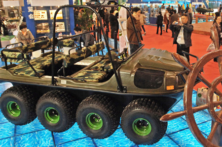 A China-made cross country vehicle is seen at the 2009 China International Tourism Commodities Fair in Yiwu city of east China&apos;s Zhejiang Province, Nov. 12, 2009. Some 60,000 exhibitors attended the fair which runs from Nov. 12 to 15. [Tan Jin/Xinhua]