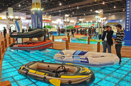 Rubber boats are seen at the 2009 China International Tourism Commodities Fair in Yiwu city of east China&apos;s Zhejiang Province, Nov. 12, 2009. Some 60,000 exhibitors attended the fair which runs from Nov. 12 to 15. [Tan Jin/Xinhua]