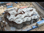 With the progress of construction, pavilions at Shanghai 2010 World Expo in various shapes are unveiled in succession. It is reported that the whole park will be basically completed at the end of this year.[sina.com.cn]