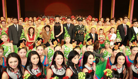 Chinese Vice Premier Hui Liangyu (6th L, C) and Deng Pufang (8th L, C), vice chairman of the National Committee of the Chinese People&apos;s Political Consultative Conference and honorary chairman of the China Disabled Persons&apos; Federation, pose for a group photo with performers after an evening gala of the 7th National Disabled People Art Performance in Beijing, capital of China, on Nov. 13, 2009. The gala named &apos;Life, Sunshine&apos; was held on Friday ahead of the International Day of Disabled Persons.[Xinhua] 