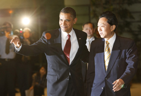 U.S. President Barack Obama (L) is greeted by Japan&apos;s Prime Minister Yukio Hatoyama upon his arrival at the latter&apos;s official residence prior to their meeting in Tokyo, Japan, Nov. 13, 2009. Barack Obama arrived Friday in Tokyo, kicking off a two-day visit to Japan.[Pool/Issei Kato/Xinhua]