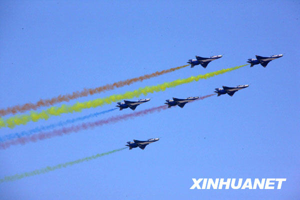 People's Liberation Army Sunday puts on an aerial show to mark the 60th founding anniversary of its air force. [Xinhua]