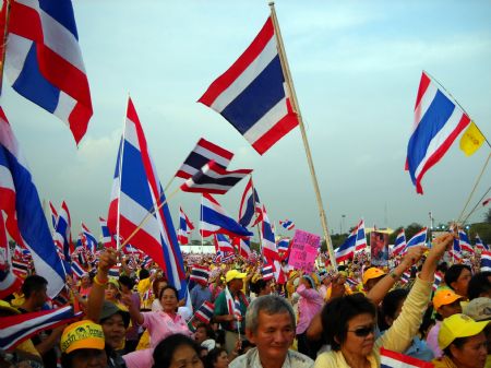 &apos;Yellow Shirt&apos;, supporters of the People&apos;s Alliance for Democracy (PAD), attend a mass rally against ousted former Thai Prime Minister Thaksin Shinawatra and Cambodian Prime Minister Hun Sen in Bangkok, capital of Thailand. Ousted former Thai Prime Minister Thaksin Shinawatra was appointed as adviser of Cambodian Prime Minister Hun Sen and the Royal Government of Cambodia King Norodom Sihamoni on Nov. 4. [Xinhua]