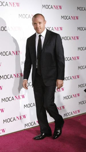 Director Guy Ritchie arrives at the MOCA (Museum of Contemporary Art) New 30th anniversary gala in Los Angeles November 14, 2009.[Xinhua/Reuters]