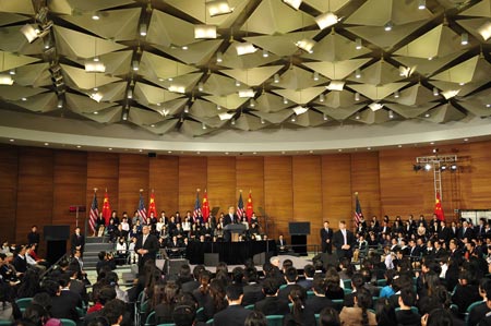 U.S. President Barack Obama delivers a speech at a dialogue with Chinese youth at the Shanghai Science and Technology Museum during his four-day state visit to China, Nov. 16, 2009.[Ding Lin/Xinhua]