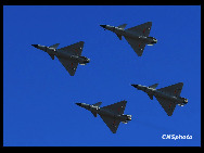 Four J-10 fighter planes perform during an air force show in Beijing, November 15, 2009. The show was staged to celebrate the 60th anniversary of the founding of People's Liberation Army (PLA) Air Force. [Xinhua]