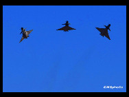 Three J-10 fighter planes perform during an air force show in Beijing, November 15, 2009. The show was staged to celebrate the 60th anniversary of the founding of People's Liberation Army (PLA) Air Force. [Xinhua]