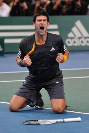 Novak Djokovic of Serbia jubilates after the final of the Paris Masters Series tennis tournament against Gael Monfils of France, Nov. 15, 2009. Djokovic won the match 2-1 and claimed the title of the event. [Xinhua]