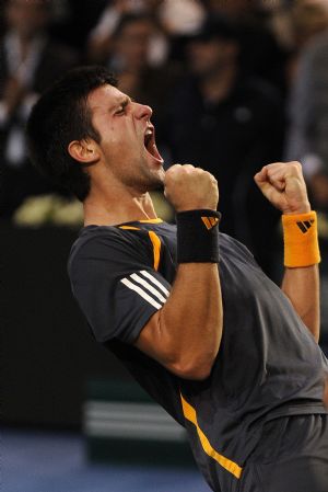 Novak Djokovic of Serbia jubilates after the final of the Paris Masters Series tennis tournament against Gael Monfils of France, Nov. 15, 2009. Djokovic won the match 2-1 and claimed the title of the event. [Xinhua] 