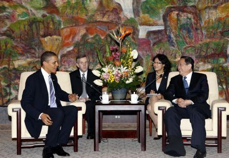 U.S. President Barack Obama(L1) meets with Yu Zhengsheng(R1), member of the Political Bureau of the Communist Party of China (CPC) Central Committee and secretary of the CPC Shanghai Municipal Committee, at the Xijiao State Guest House in Shanghai, Nov. 16, 2009. [Zhang Ming/Xinhua]