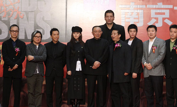 Cast members and crew promote the upcoming action movie 'Bodyguards and Assassins' in Nanjing, Jiangsu Province on November 12, 2009.
