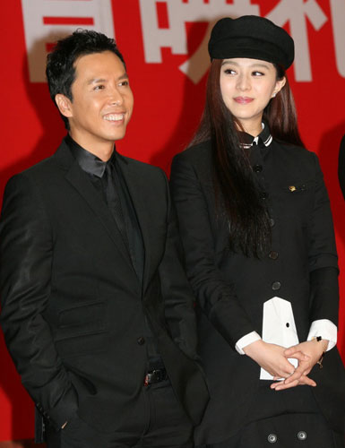 Cast members Donnie Yen (left) and Fan Bingbing promote the upcoming action movie 'Bodyguards and Assassins' in Nanjing, Jiangsu Province on November 12, 2009.