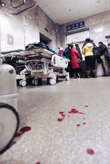 Yang Jingwei remains in a coma but in stable condition in hospital.