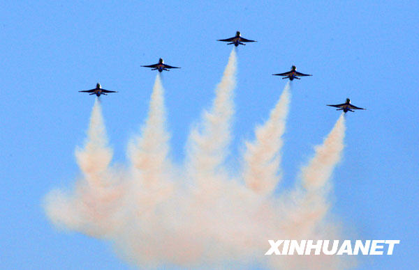 People's Liberation Army puts on an aerial show to mark the 60th founding anniversary of its air force.