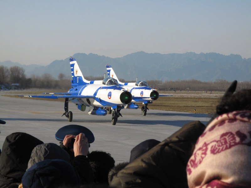 Photo taken on November 15 shows two J-7GB air fighters just finish performance and greet the crowd during an air force show in Beijing Shahe airport. [Jiang Yiping/China.org.cn]