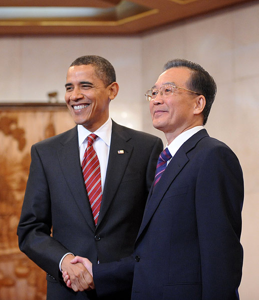 Chinese Premier Wen Jiabao meets visiting U.S. President Barack Obama at Diaoyutai State Guesthouse in Beijing on Nov. 18, 2009. [Yao Dawei/Xinhua]