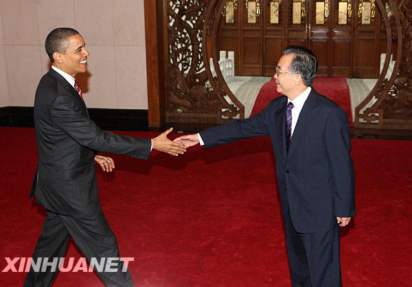 Chinese Premier Wen Jiabao meets visiting U.S. President Barack Obama at Diaoyutai State Guesthouse in Beijing on Nov. 18, 2009. [Yao Dawei/Xinhua]