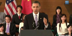 Obama interacts with young Chinese
