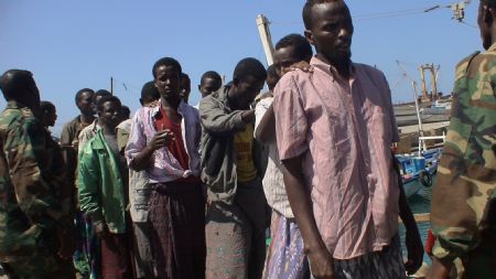 Suspected Somali pirates stay at the northeastern Somali port town of Bossaso, Nov. 18, 2009. The Spanish Navy patroling Somali coast handed over 12 suspected pirates to the local authorities on Wednesday. (Xinhua)
